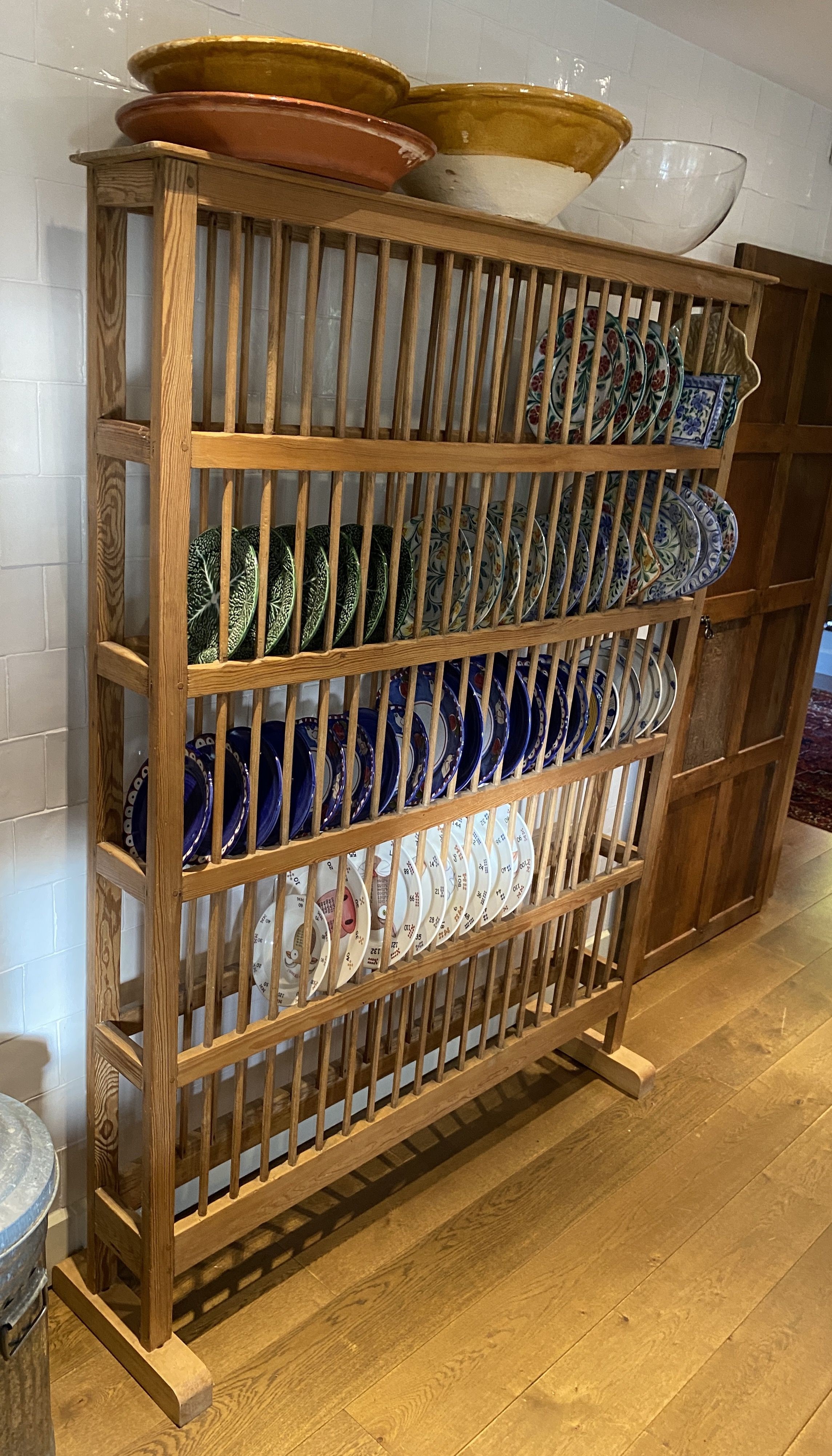 An unusually large Victorian pine and ash freestanding five tier plate rack, width 140cm height 186cm